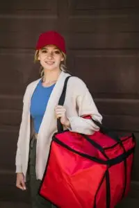 Young Woman with a Food Delivery Bag